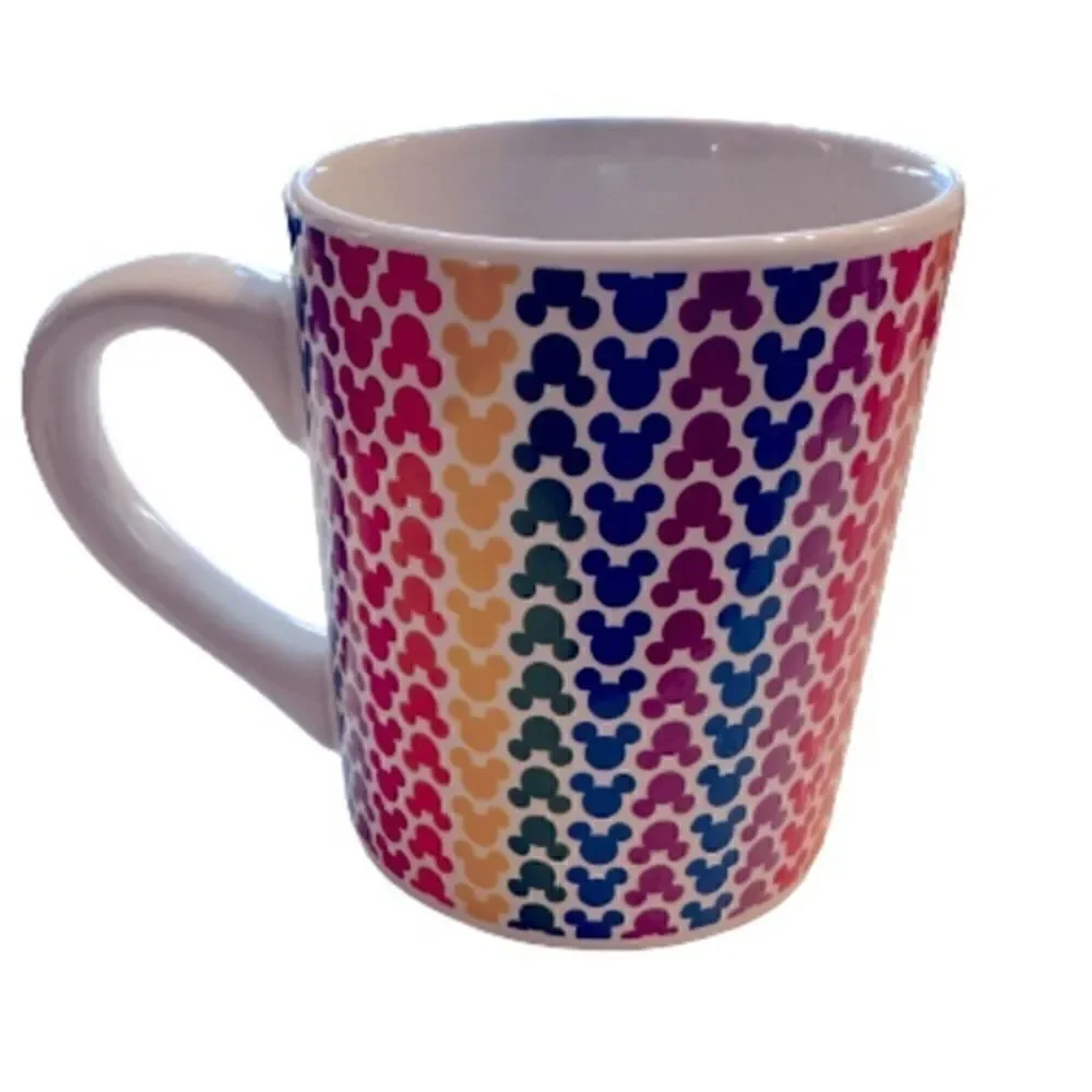 Disney Mickey Mouse Rainbow mug 14 oz. Small silhouettes of Mickey Mouse’s Head